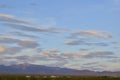 Sunrise clouds over mountain range and valley in Mojave Desert, USA Royalty Free Stock Photo