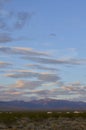 Sunrise clouds over mountain range and valley in Mojave Desert, USA Royalty Free Stock Photo