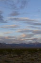 Sunrise clouds over mountain range and valley in Mojave Desert, USA Royalty Free Stock Photo