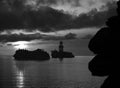 Calm sea and ships in the bay at sunrise