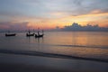 Sunrise, the colors of the morning sky with fishing boats Royalty Free Stock Photo