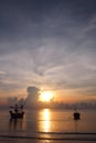 The fishing boats with Sunrise, the colors of the morning sky. Royalty Free Stock Photo