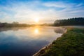 Sunrise concept. Bright morning near foggy river curve, beautiful landscape Royalty Free Stock Photo