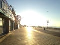 Sunrise on Coney Island Boardwalk. Royalty Free Stock Photo