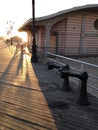 Sunrise on Coney Island Boardwalk. Royalty Free Stock Photo