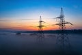 Electrifying Dawn: Power Transmission Lines in the Morning Glow