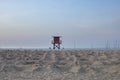 Sunrise Copacabana beach with red vintage lifeguard post