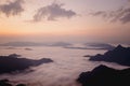 Sunrise with dark mountain and mist Royalty Free Stock Photo