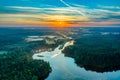 Sunrise or dawn over the river. Sunset over forest or lake. Rising of the sun over beautiful nature in temperate zone Royalty Free Stock Photo