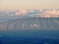 Sunrise dawn and view of West Maui and Lanai seen from the summit of Haleakala, Haleakala Volcano National Park, Maui Hawaii Royalty Free Stock Photo