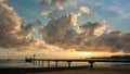 A jetty stretching out into the tropical sea Royalty Free Stock Photo