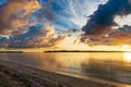 Sunrise dramatic sky over sea, tropical islands, unique stormy clouds and golden sunlight, travel destination, Indonesia Banyak Royalty Free Stock Photo