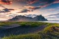 Sunrise dramatic sky over Vestrahorn mountain on black sand beach in Stokksnes peninsula at Iceland Royalty Free Stock Photo