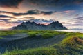 Sunrise dramatic sky over Vestrahorn mountain on black sand beach in Stokksnes peninsula at Iceland Royalty Free Stock Photo