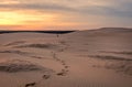 SUNRISE ON THE DUNE OF PILAT IN WINTER