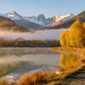 Sunrise Elegance: Foggy Lake, Mountains in Cozy Morning Hues Royalty Free Stock Photo