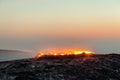 Sunrise at Erta Ale volcano and lava fields