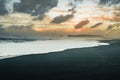 Sunrise at famous Black Sand Beach Reynisfjara in Iceland. Windy Morning. Ocean Waves. Colorful Sky. Morning Sunset. Royalty Free Stock Photo