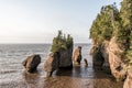 Sunrise famous Hopewell Rocks geologigal formations at low tide biggest tidal wave Fundy Bay New Brunswick Canada