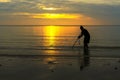 Sunrise fisherman and background in beach