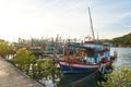 Sunrise Fishing boats at the port, bridge, thailand