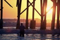 Sunrise fishing by the pier