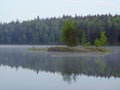 Sunrise and fog in a beautiful lake in Karelia Royalty Free Stock Photo