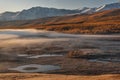 Sunrise fog lake mountains trees autumn Royalty Free Stock Photo