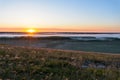 Sunrise, fog over the river panorama of the landscape in the early morning. pink sky before sunrise . background image Royalty Free Stock Photo