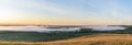 Sunrise, fog over the river panorama of the landscape in the early morning. pink sky before sunrise . background image Royalty Free Stock Photo