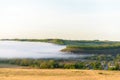 Sunrise, fog over the river panorama of the landscape in the early morning. pink sky before sunrise . background image Royalty Free Stock Photo