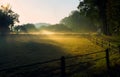 Sunrise in foggy landscape