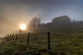 Sunrise on a foggy morning, beautiful landscape Royalty Free Stock Photo