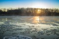 Sunrise during freeze-up in the river