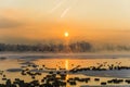 sunrise on a frosty foggy morning over the Yenisei River Royalty Free Stock Photo