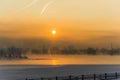 sunrise on a frosty foggy morning over the Yenisei River Royalty Free Stock Photo