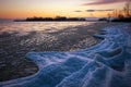 Sunrise and frozen river. Beautiful winter landscape with lake in morning time. Daybreak Royalty Free Stock Photo