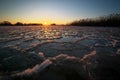 Sunrise and frozen river. Beautiful winter landscape with lake in morning time. Daybreak Royalty Free Stock Photo