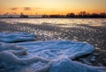 Sunrise and frozen river. Beautiful winter landscape with lake in morning time. Daybreak Royalty Free Stock Photo