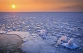 Sunrise and frozen sea. Beautiful winter landscape with lake in morning time. Daybreak Royalty Free Stock Photo