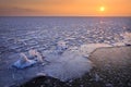 Sunrise and frozen sea. Beautiful winter landscape with lake in morning time. Daybreak Royalty Free Stock Photo