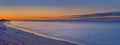 Sunrise at Ft DeSoto overlooking the Sunshine Skyway Bridge - Pano Royalty Free Stock Photo