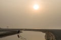Sunrise in river side at Gangasagar,West Bengal,India.
