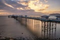 Sunrise golden light over Llandudno Pier in the Victorian seaside resort in North Wales Royalty Free Stock Photo