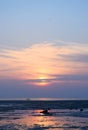 Sunrise with Golden Sun behind Clouds and Colorful Sky - Vijaynagar Beach, Havelock Island, Andaman, India Royalty Free Stock Photo