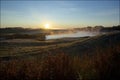 Sunrise in the golf club with mist and birds Royalty Free Stock Photo