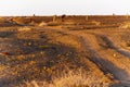 Sunrise gravel road.Suvs and making a concept.