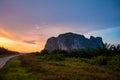 Sunrise at the Gua Charas, Pahang, Malaysia. Sun is rising behind the rock