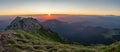 sunrise with haze from the Piatra Craiului mountain range in the Romanian Carpathians panorama Royalty Free Stock Photo