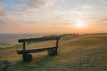 Sunrise at hesselberg hill, with lonely bench